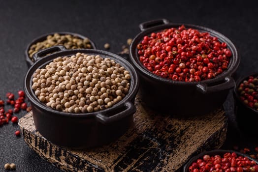 White allspice in a ceramic bowl on a dark concrete background