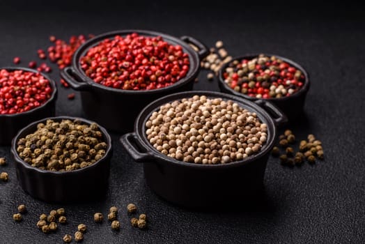 White allspice in a ceramic bowl on a dark concrete background
