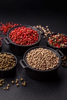 White allspice in a ceramic bowl on a dark concrete background