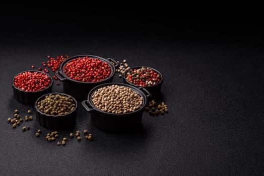 White allspice in a ceramic bowl on a dark concrete background