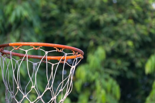 Basketball hoop make by wooden and ball in park