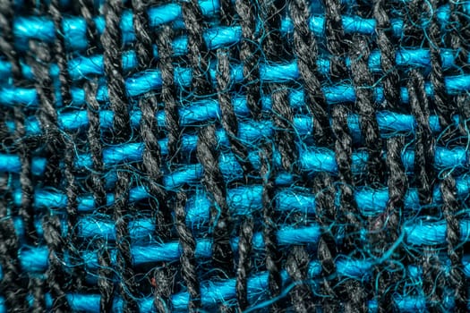 Macro of fabric weave texture surface blue, green and black color use for background
