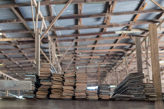 Slat and Timber wood from natural hardwood in warehouse for a construction
