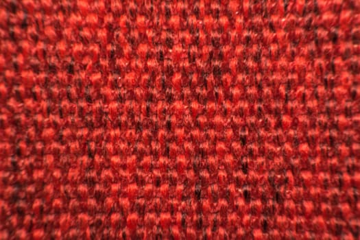 Macro of fabric weave texture surface red or pale orange color use for background
