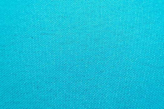 Macro of fabric weave texture surface blue color use for background