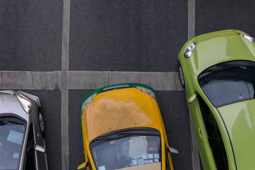 Car wait to go at intersection with traffic light on a road.