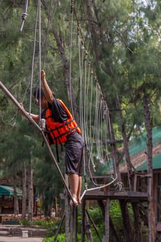Asia people travel at adventure bases camp sky walker in Thailand