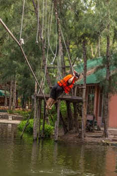 Asia people travel at adventure bases camp sky walker in Thailand