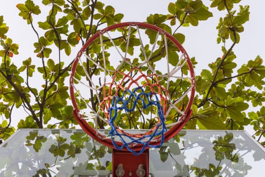 Basketball hoop make by wooden and ball in park