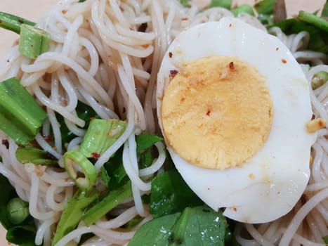Rice vermicelli noodle spicy salad with mackerel for sale at Thai street food market or restaurant in Thailand