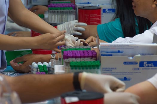 Collection blood in lab for checkup a health check by doctor and nurse