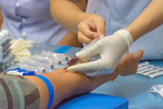 Collection blood in lab for checkup a health check by doctor and nurse