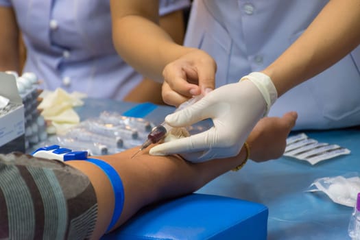 Collection blood in lab for checkup a health check by doctor and nurse