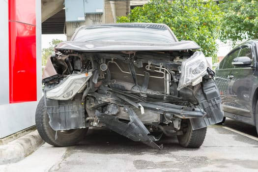 Car crash from car accident on the road in a city wait insurance.
