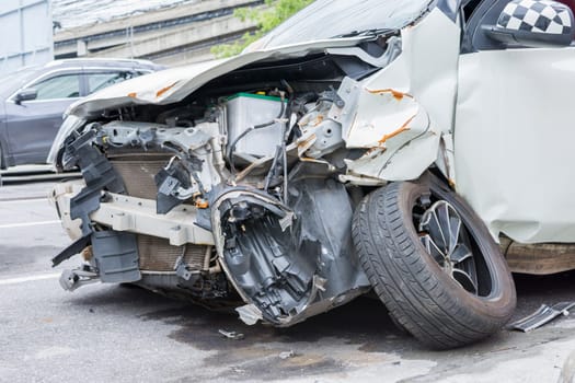 Car crash from car accident on the road in a city wait insurance.