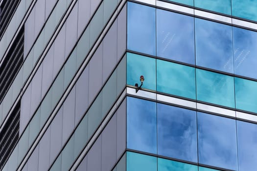 Big glass office building in a Bangkok city