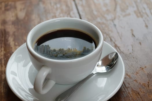 Sunshine morning time and city reflection on coffee , process in vintage style