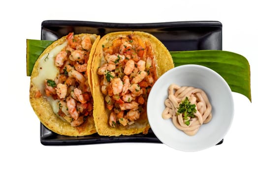 La Viga tacos with shrimps and mexican sauces