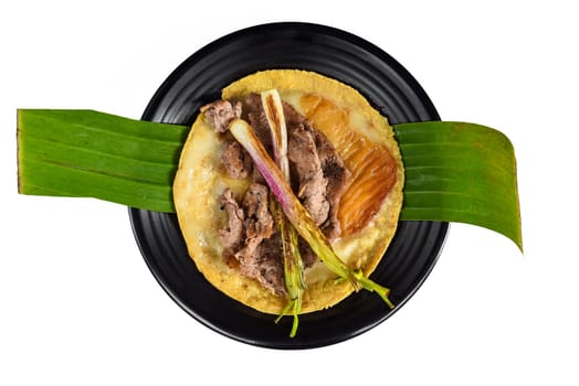 Tacos Zocalo steak with grilled cheese on black plate isolated on white background  top view