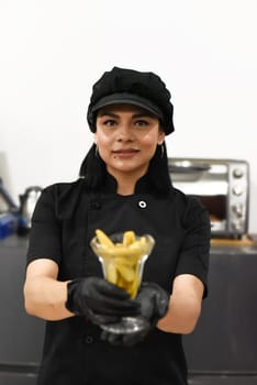Mexican woman serving santa fe (caramelized banana with whisky) in mexican cafe