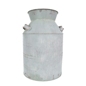 This rustic milk container sits in a rural setting, showcasing agricultural history and charm.