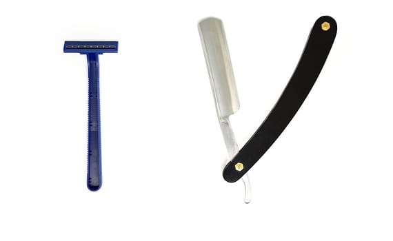 Straight razor and usual razor on white background