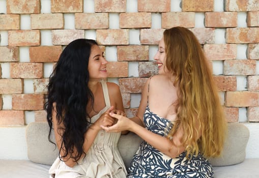 Russian beautiful blonde woman talking with her best friend