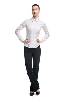 Business woman in white tshirt and black trousers isolated full-length view