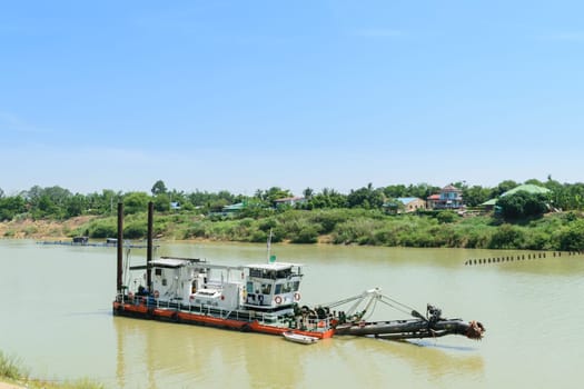 Ang Thong, Thailand - May 3, 2015 :  Unidentified dredge boat working in Chao Phraya River at Ang Thong Province, Thailand