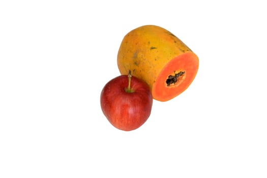 Apple and sliced papaya isolated on white background, clipping path included.