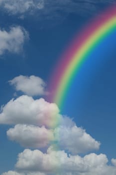 Nature cloudscape with blue sky and white cloud with rainbow