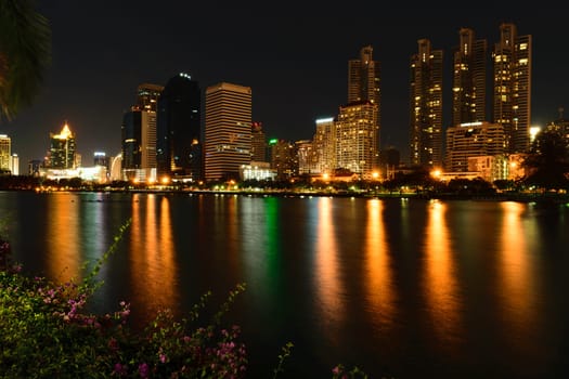 Bangkok, Thailand - June 6, 2015 : Bangkok city night view and Benchakitti Park. Bangkok is the capital and the most populous city of Thailand.