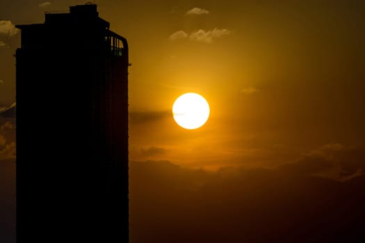 Morning Sky with Sunrise and silhouette building in city