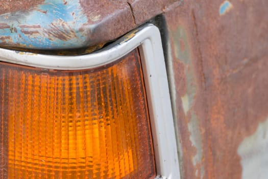 Old Taillight of vintage car with rust