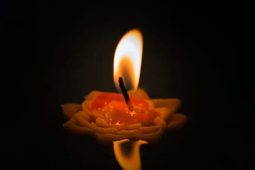 Candles flower floating on a water
