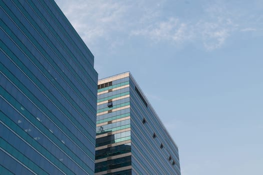 Big glass office building in a Bangkok city
