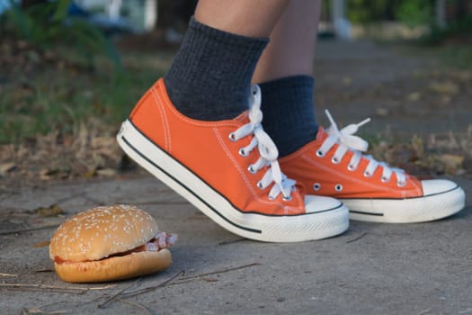 Good bye junk food hamburger left to jogging exercise