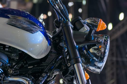 Zoom at motorcycle oil tank and headlight in Car show event at Bangkok, Thailand. This a open event no need press credentials required.