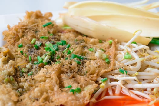 Crisp fried mussel pancakes. Shell fried with vegetables (Hoi Tod)