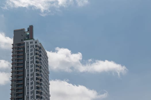 Big office building and sky in a Bangkok city