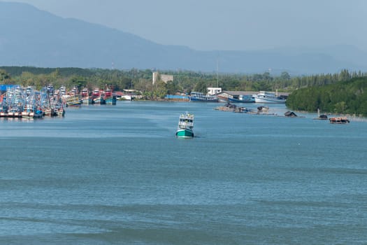 Fishing boat is out fishing. Fishermen is a career that has been popular in the seaside city of Thailand.
