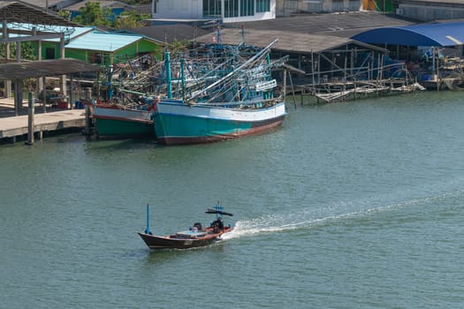 Fishing boat is out fishing. Fishermen is a career that has been popular in the seaside city of Thailand.