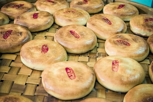 Chinese pastry or Moon cake is asia dessert on traditional basket
