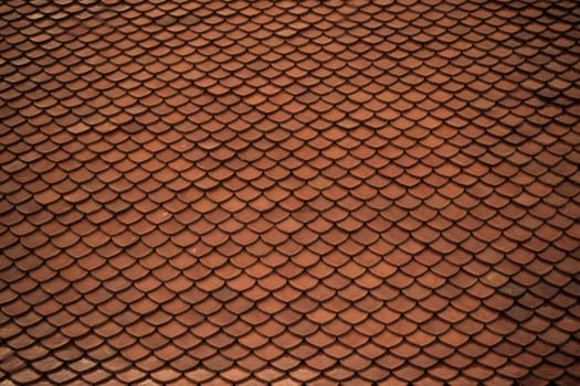 Tile roof of old Thai temple texture background surface natural color , process in vintage style
