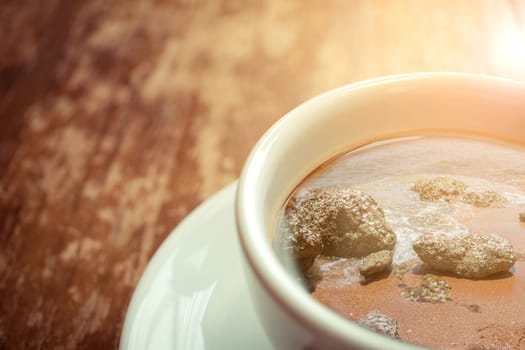 Beach and tropical sea with rock in nature reflection on coffee , process in vintage style