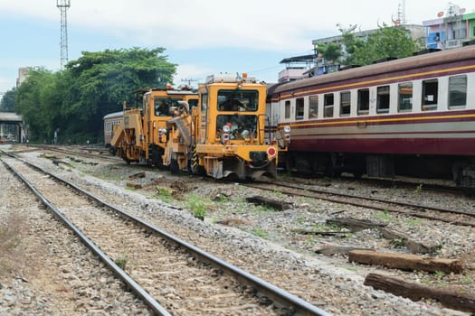 Bangkok, Thailand - September 5, 2015 : Restoration the railroad tracks by Plasser and Theurer machine at State Railway of Thailand.