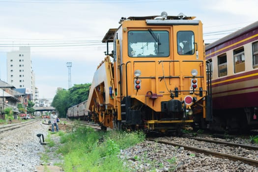 Bangkok, Thailand - September 5, 2015 : Restoration the railroad tracks by Plasser and Theurer machine at State Railway of Thailand.