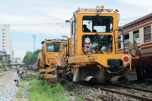 Bangkok, Thailand - September 5, 2015 : Restoration the railroad tracks by Plasser and Theurer machine at State Railway of Thailand.