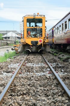 Bangkok, Thailand - September 5, 2015 : Restoration the railroad tracks by Plasser and Theurer machine at State Railway of Thailand.