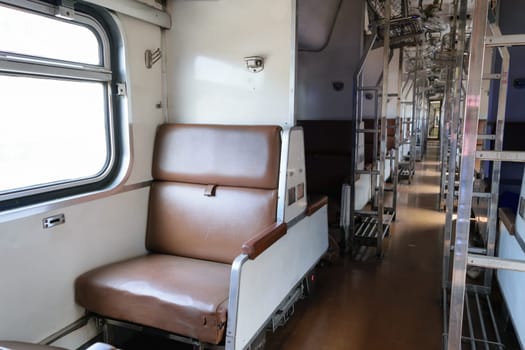 Cabin of a Public Thai Train Railway with seat. This is a public train Does not require a property release.